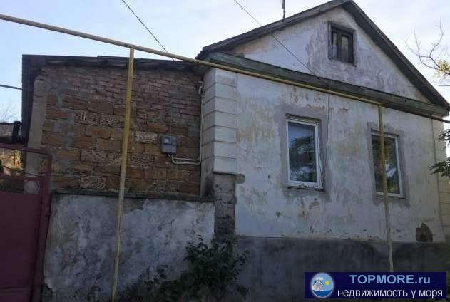Продается требующий ремонта дом 48.4 кв м, участок 5,4 сотки в г. Феодосия, ул.Большевистская. 2 комнаты, кухня,...