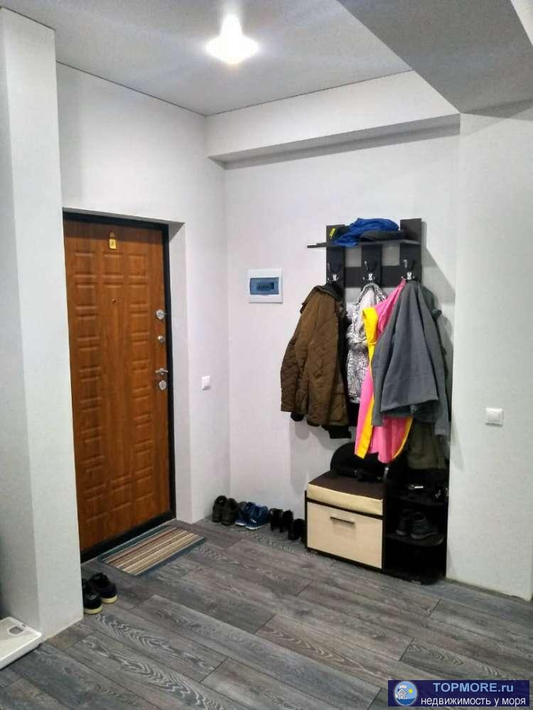 Продаю полуторокомнатную квартиру в спальном районе Красной поляны. Ремонт, мебель, два видовых балкона. Газовая... - 1