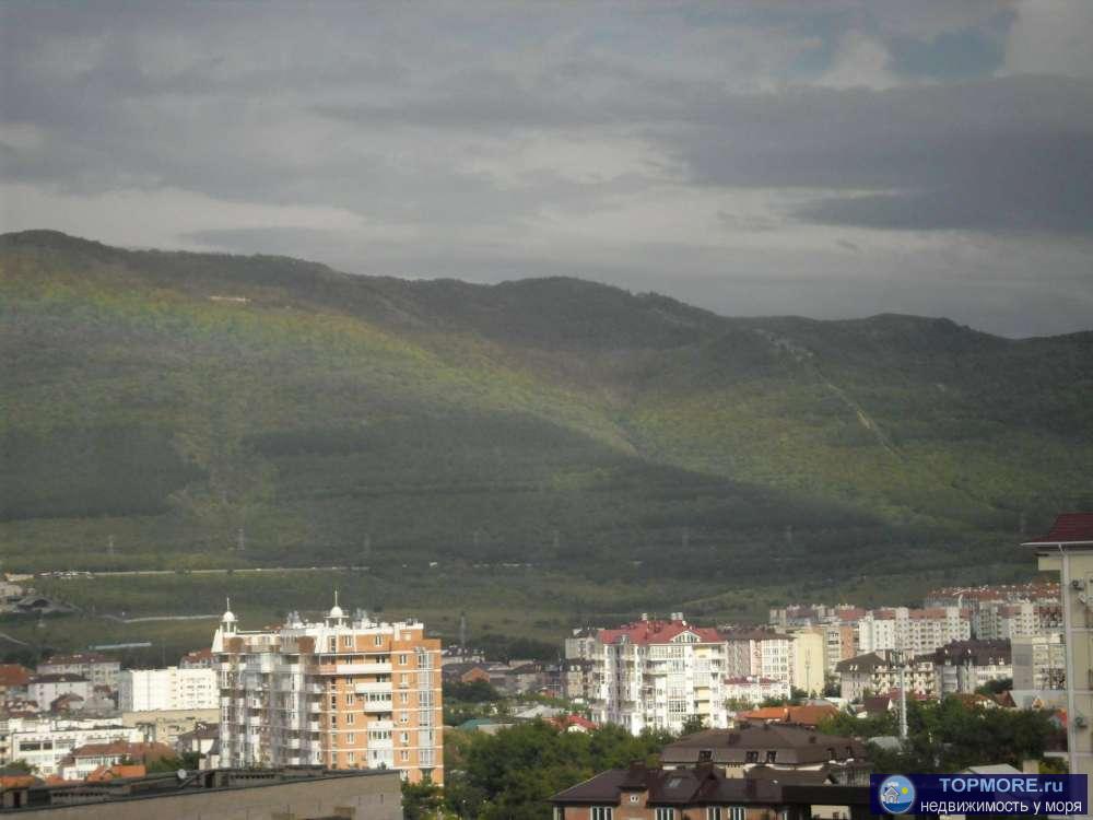 кв.находится в тихом р-оне города с видом на горы ,до моря 1.5км