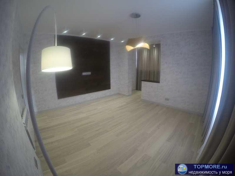 Продается квартира с дизайнерским ремонтом в новом кирпичном доме в Анапе  Площадь (общ\жил\кухня): 61.68/34.49/12.73... - 11