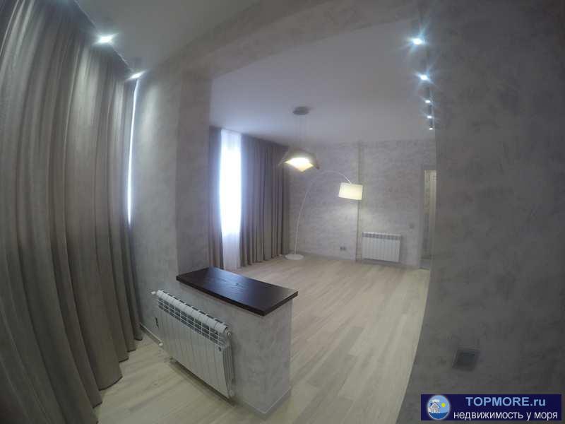 Продается квартира с дизайнерским ремонтом в новом кирпичном доме в Анапе  Площадь (общ\жил\кухня): 61.68/34.49/12.73... - 7